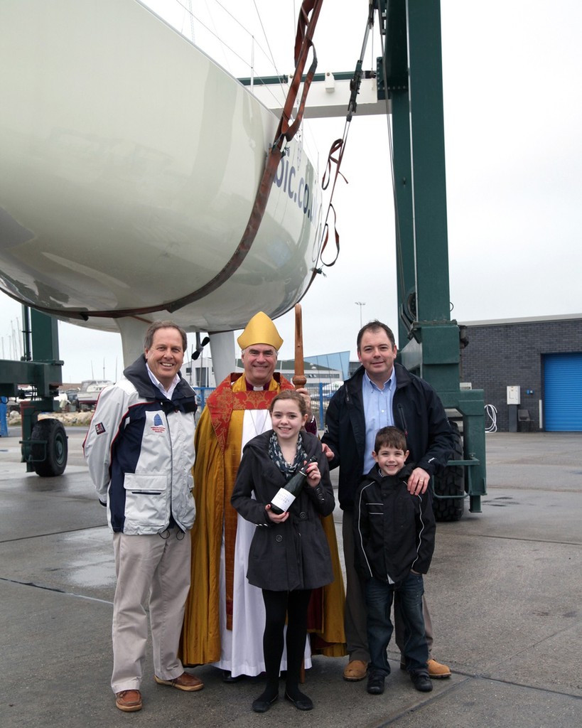 Left to right John Tweed, Chief Executive of the Weymouth and Portland National Sailing Academy, The Bishop of Sherborne and Charlie Walker, Managing Director of the Round Britain and Ireland Challenge with his children © Helen Ellis